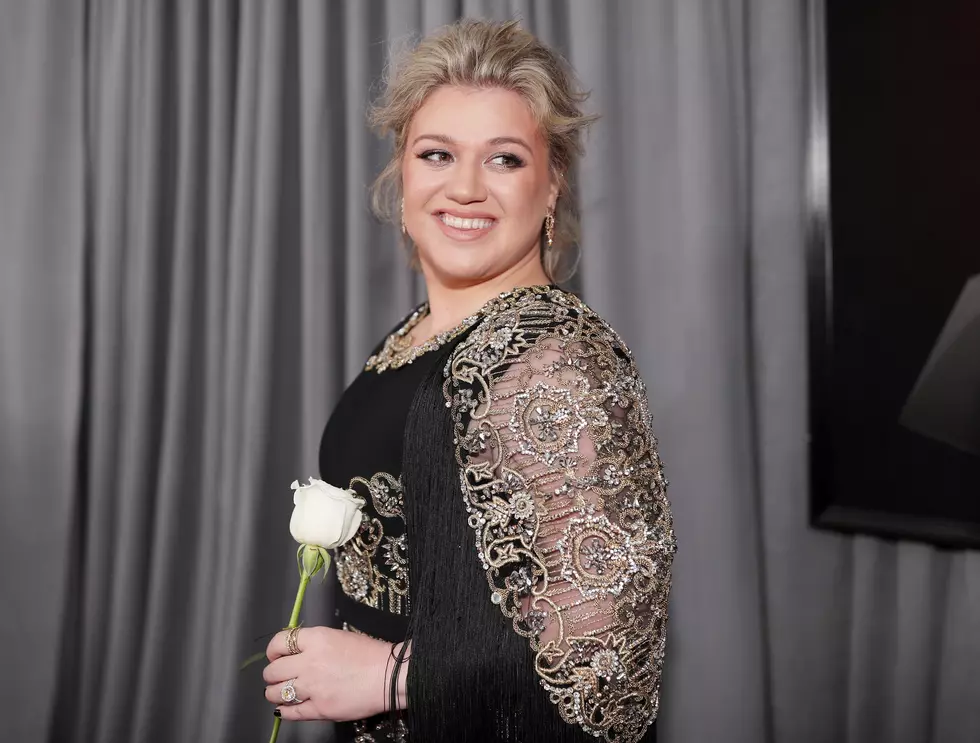 Why Are Celebrities Wearing White Roses at the Grammy Awards?